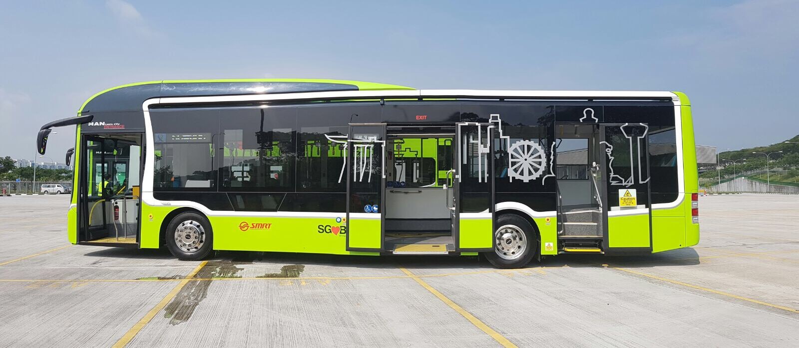 A three-door single-deck bus in Singapore.
