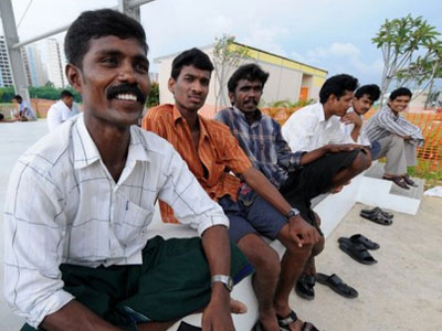 Some NGOs are giving free 3G mobile phones to foreign workers in Singapore. 