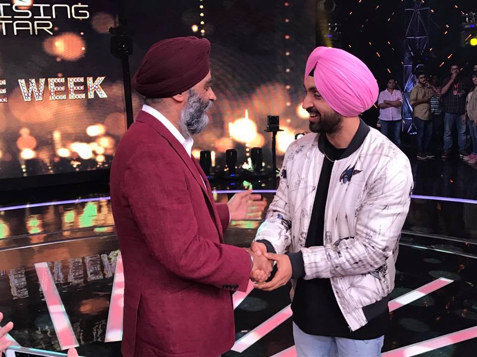 Diljit Dosanjh (left) with Harjit Sajjan