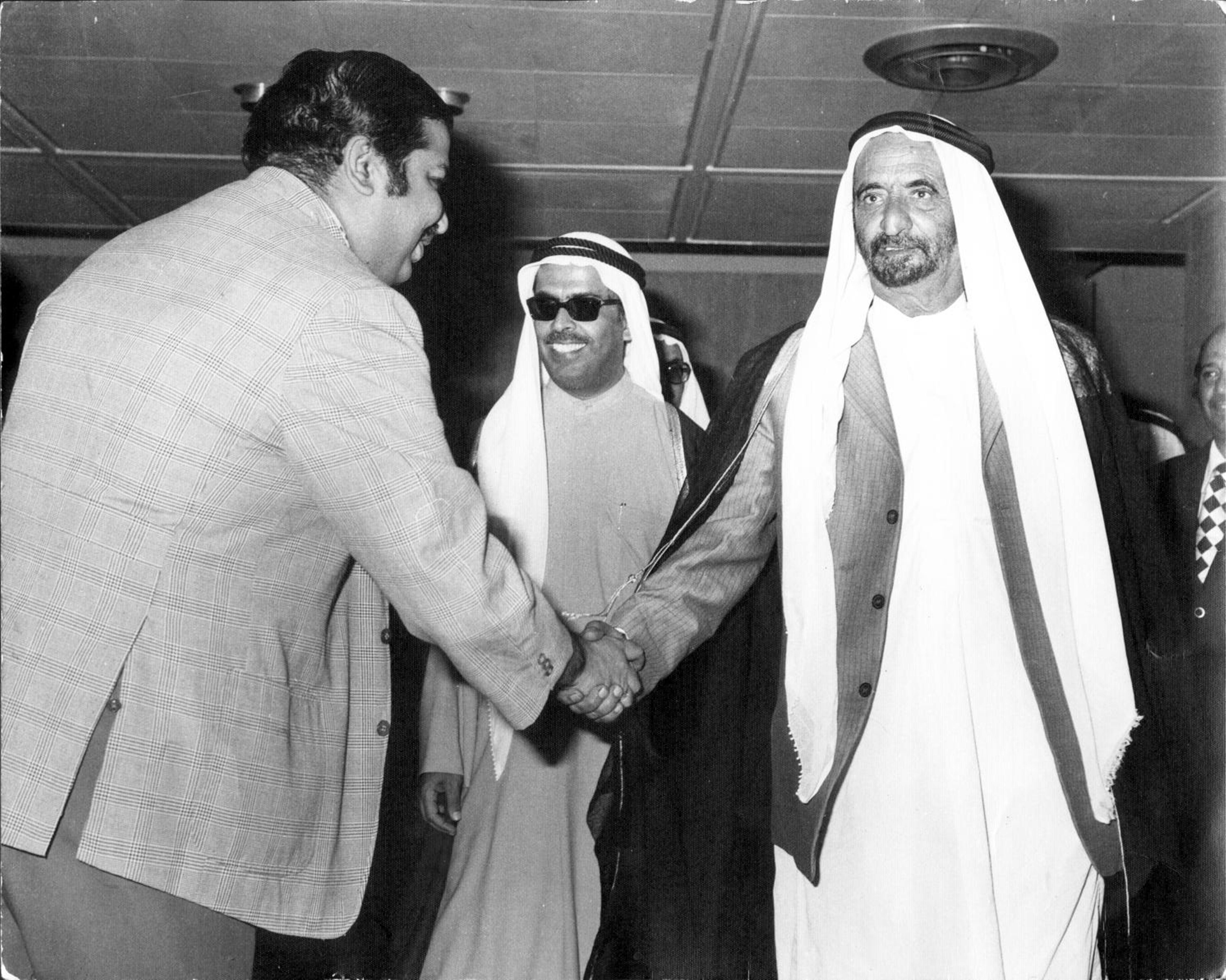 Meeting the late HH Sheikh Rashid bin Saeed Al Maktoum, then Ruler of Dubai, at a trade fair organized by Dubai Chamber of Commerce and Industry in the late 1960s. Saif Al Ghurair, the then President of the Chamber is in the centre. Photo courtesy: ITL Cosmos Group