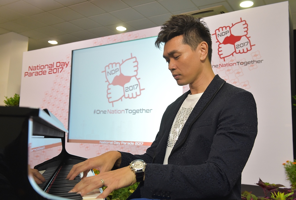 Jay Lim performing the NDP 2017 theme song live at The Float @ Marina Bay.