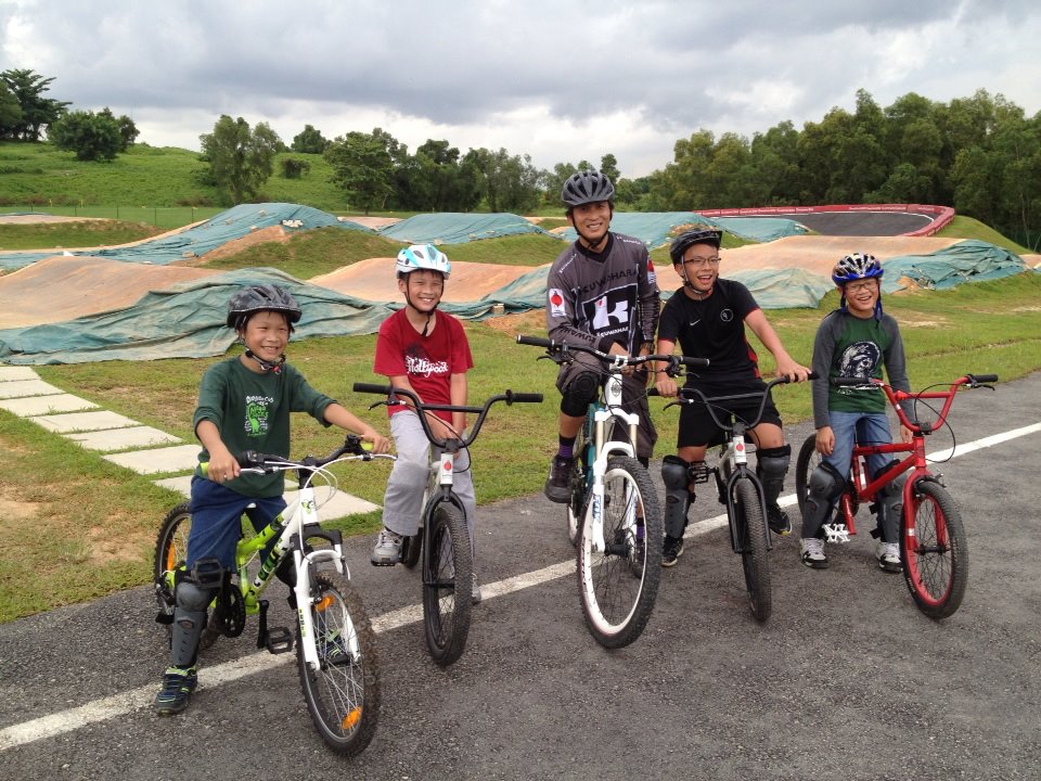 Trainers of Singapore Cycling Federation (SCF) impart training of cycling to school children. 