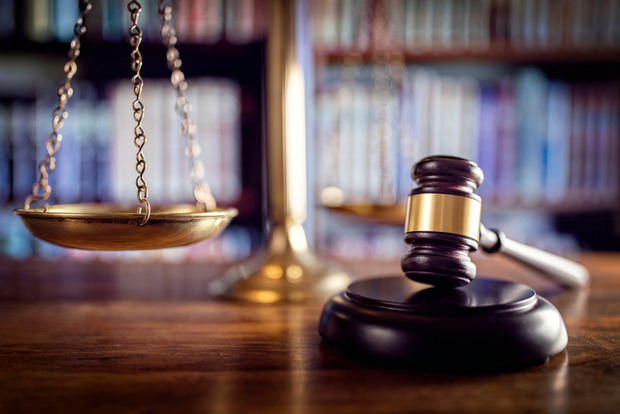 Twin Indian-origin brothers have been sentenced for five months in jail and three strokes of cane for attacking a compatriot in Singapore. 