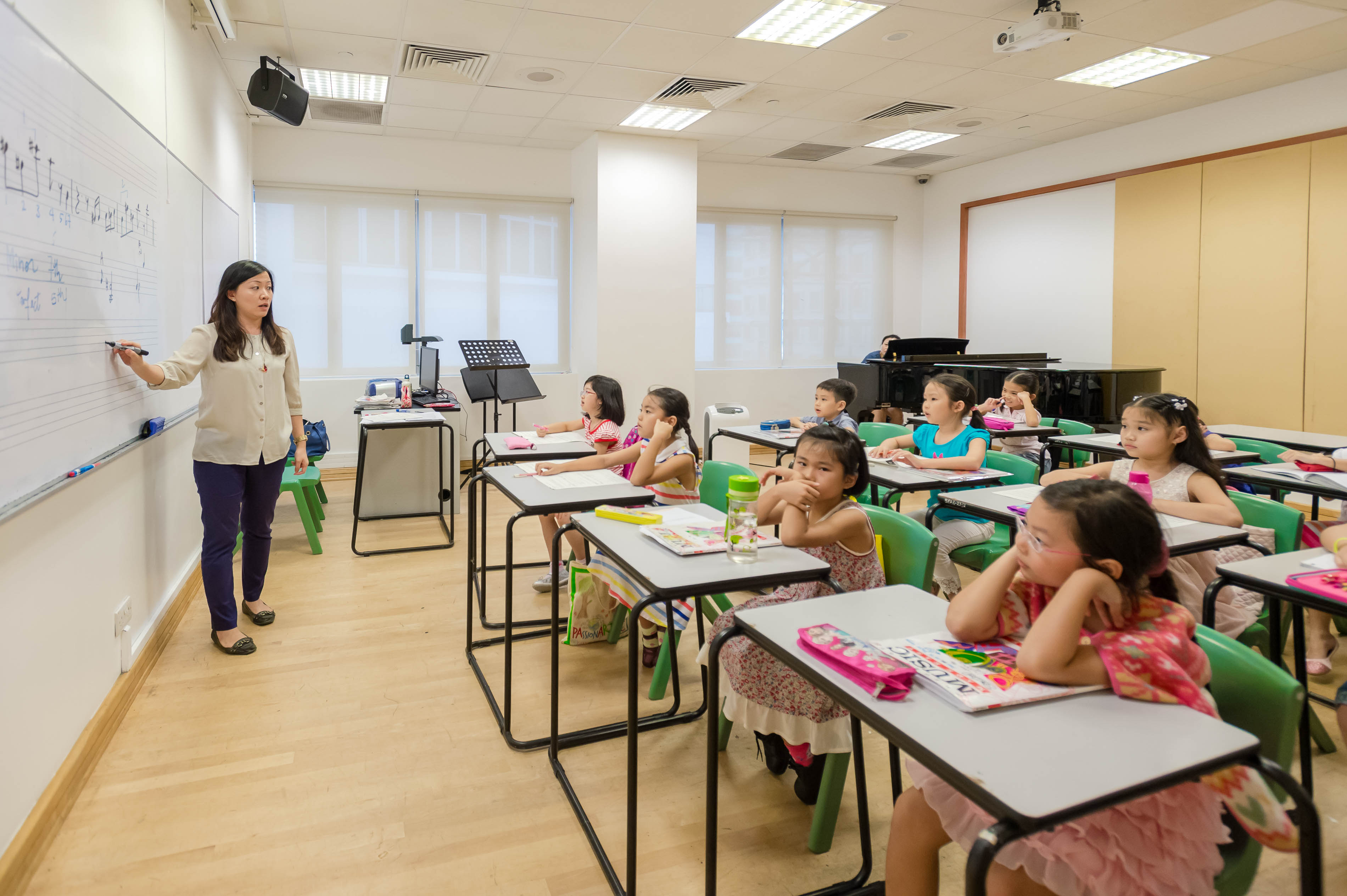 Children attending a class room in Singapore.
