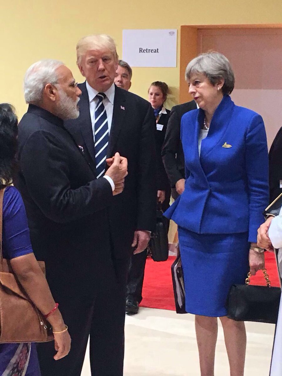 The Indian PM with his British counterpart Theresa May (right) and US President Donald Trump (centre).