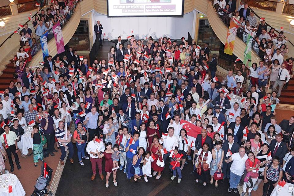 Group photo with fellow Singaporeans and friends of Singapore at the early National Day Reception. Photo courtesy: MCI Kenji Soon