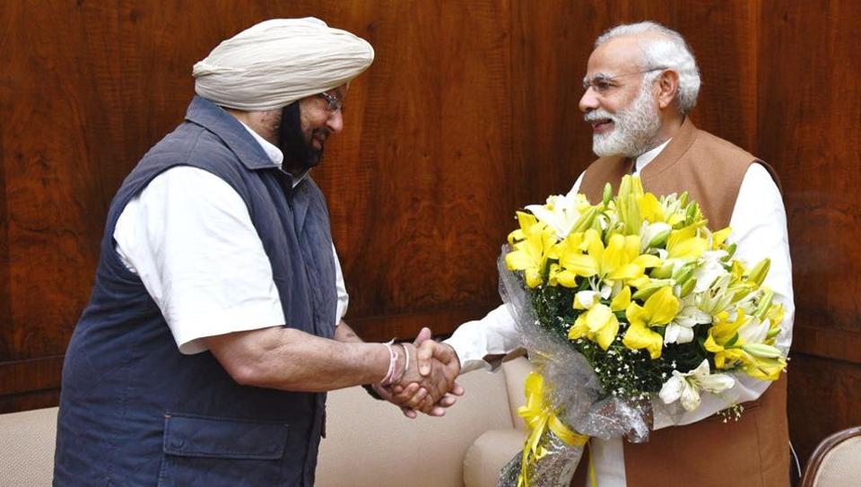 Punjab CM Capt Amarinder Singh (left) with Indian PM Narendra Modi.