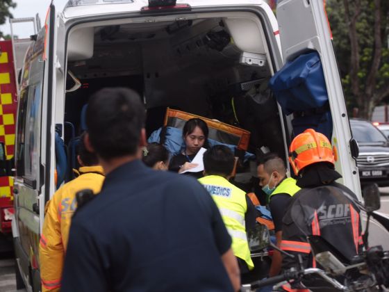 Injured people being rescued from the site of chemical leak at Kallang Way factory.