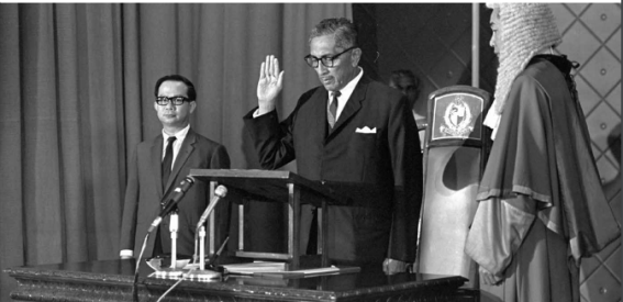 Yusof Ishak taking his oath as he is being sworn-in as President of the Republic of Singapore in 1967 at the Istana. 