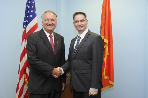 Dilip Chauhan (right) named Deputy Comptroller for Minority Affairs. 