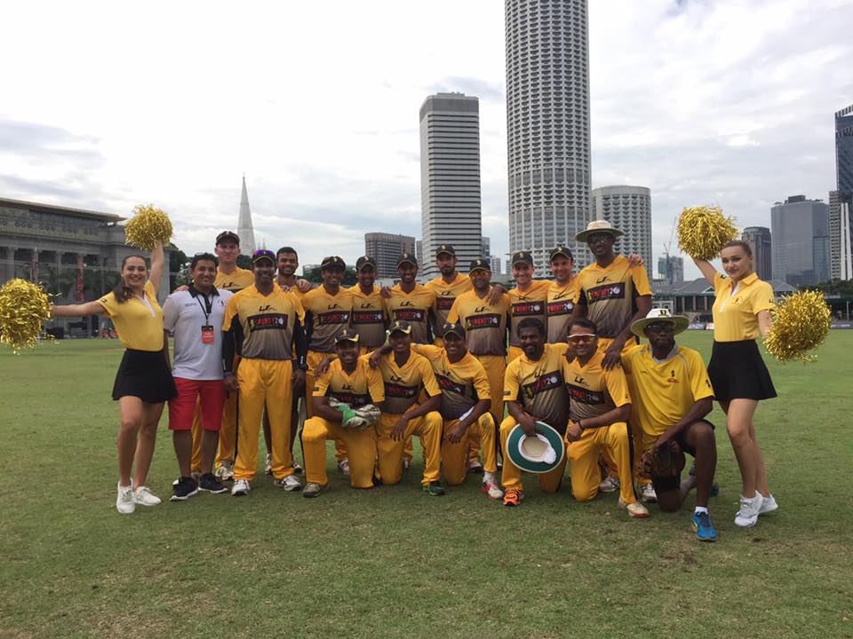 The SCC team with tournament chairman Pushpendra Sharma (left) and cheerleaders.
