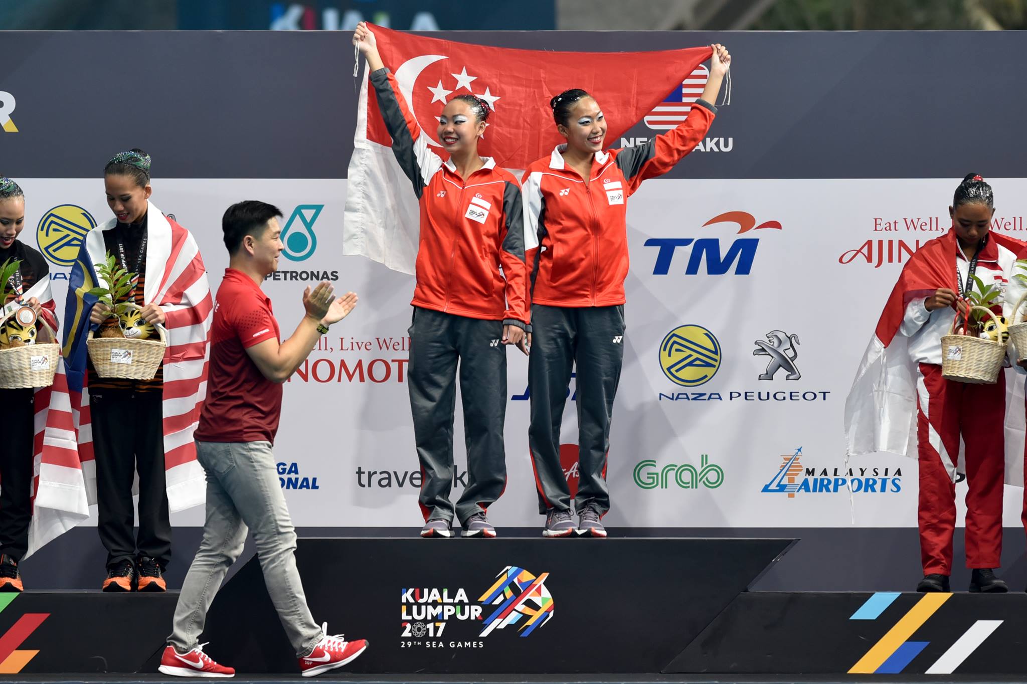 18 August: Team Singapore Synchronised Swimming Duet Technical Routine Finals - Gold medallists Miya Yong and Debbie Soh at the Victory Ceremony. Photo courtesy: Andy Pascua