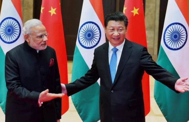 Indian Prime Minister Narendra Modi (right) with Chinese Premier Xi Jinping. Photo courtesy: BRICS
