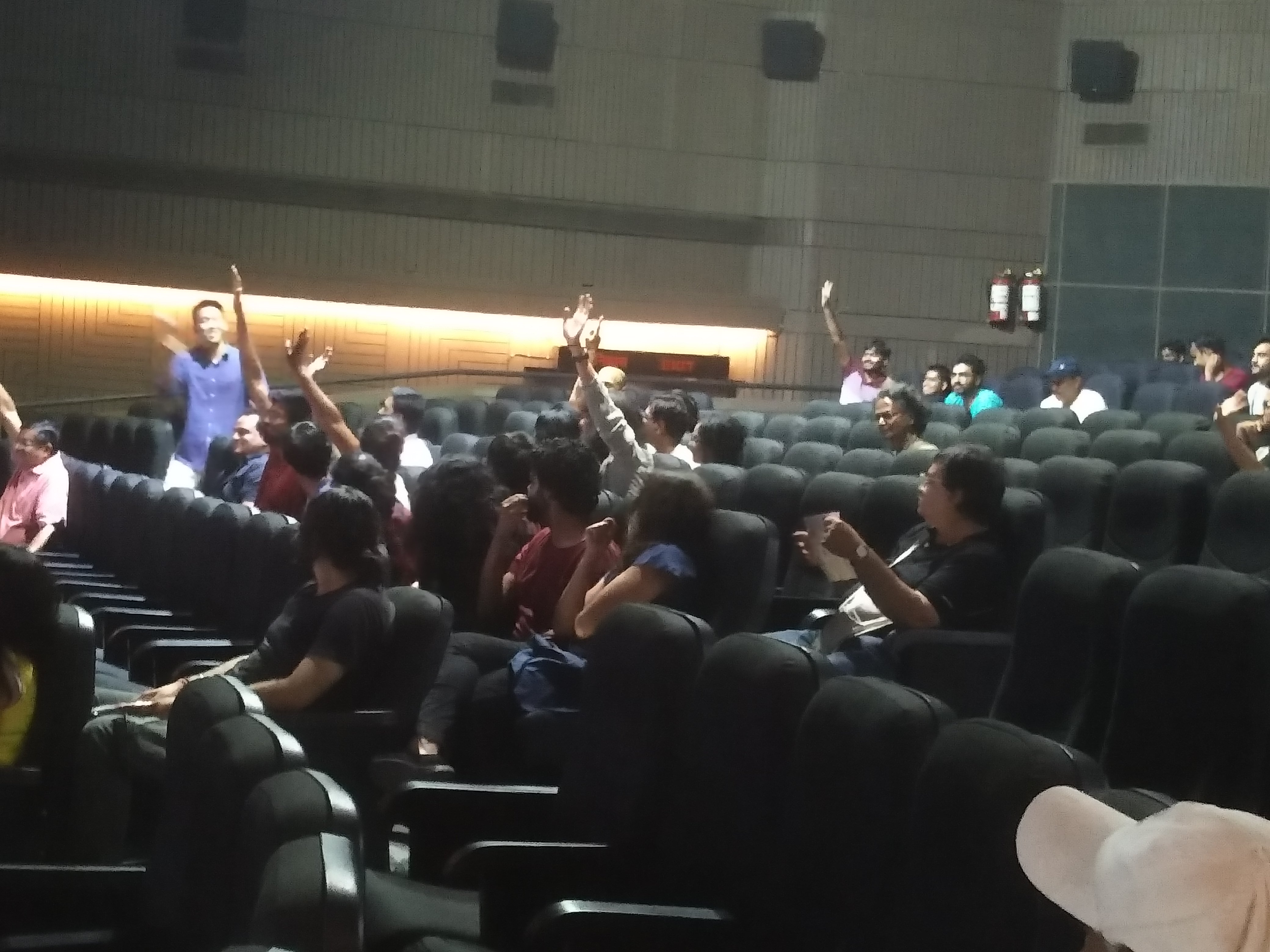 The audience participating in the quiz.