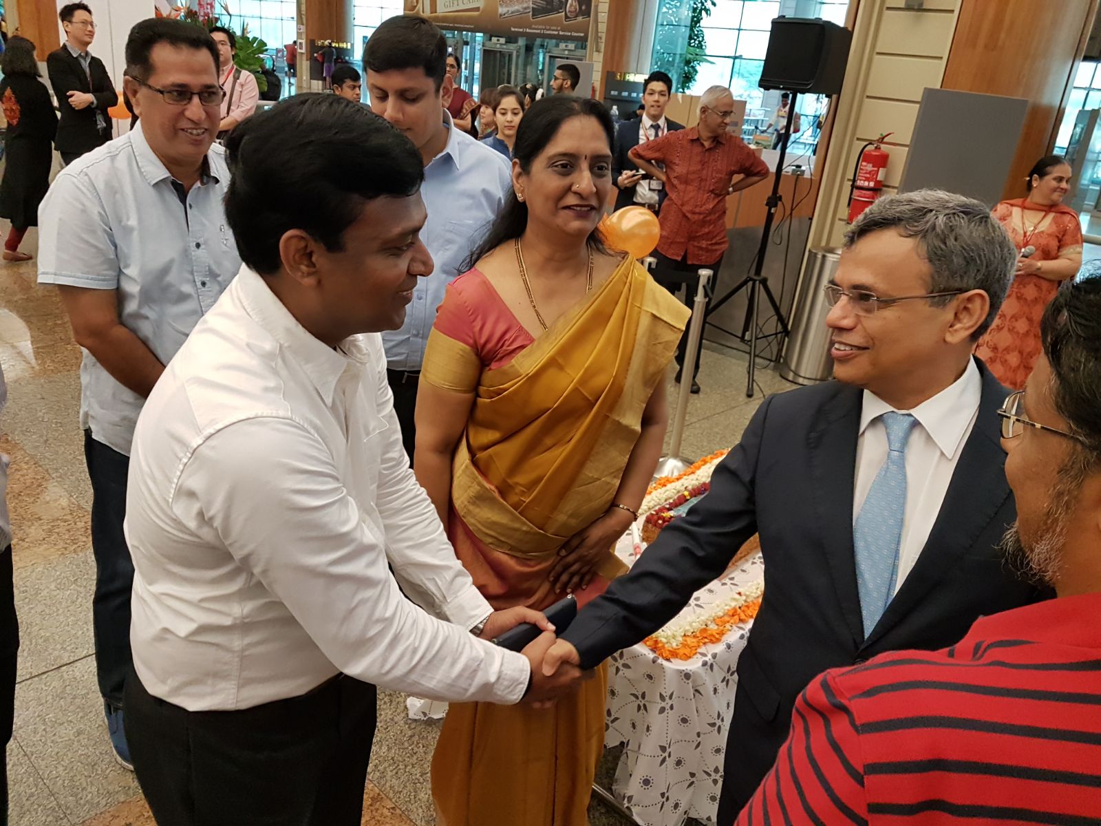 H.E. Jawed Ashraf, High Commissioner of India to Singapore (right) and Sowmya Srinivasan, Country Manager, Air India, Singapore ( middle) present during the launch of Singapore-Madurai flight at Changi Airport Terminal 2.