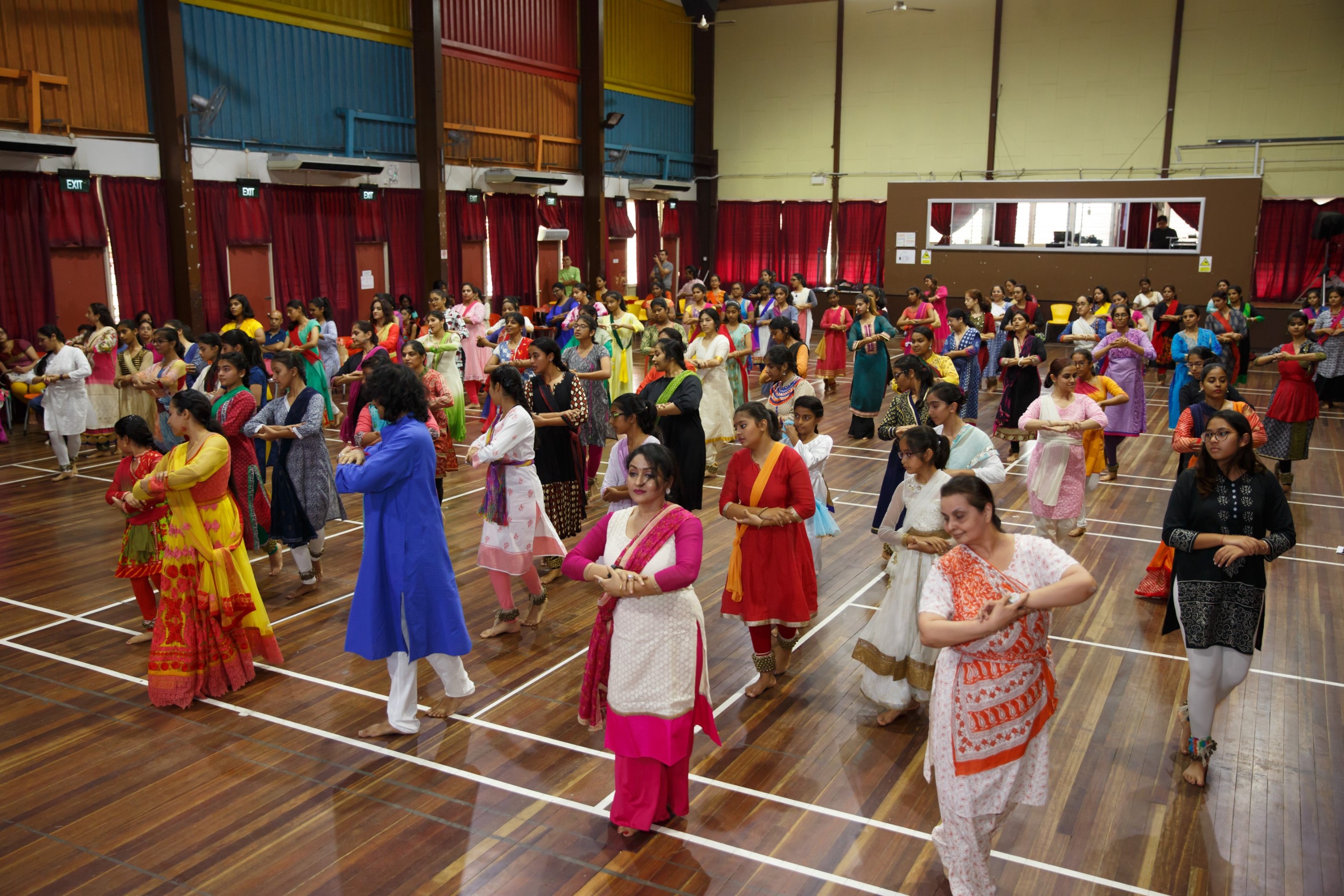Workshop particpants practicing Kathak movements under Pandit Birju's tutelage.