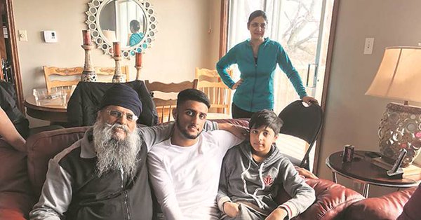 Sunny Dhalliwal (centre) with his family.