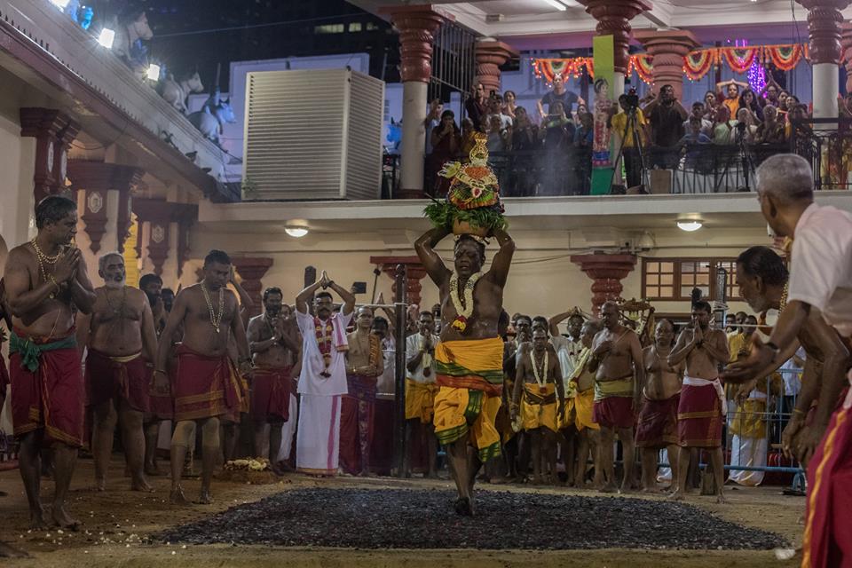 Chief priest (Pandaram) K Swaminathan of Sri Mariamman Temple, walking on the the fire pit during Theemithi ceremony in Singapore. 