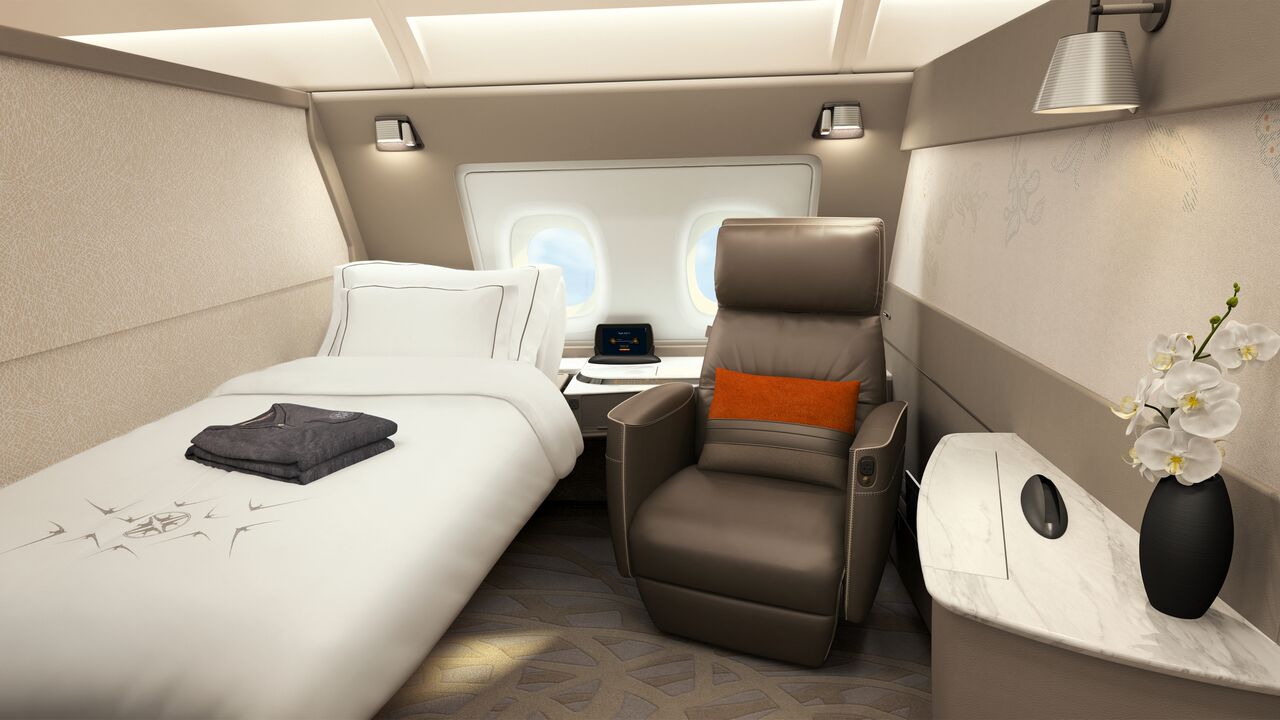 Each suite is furnished with a separate full-flat bed with adjustable recline and plush leather chair