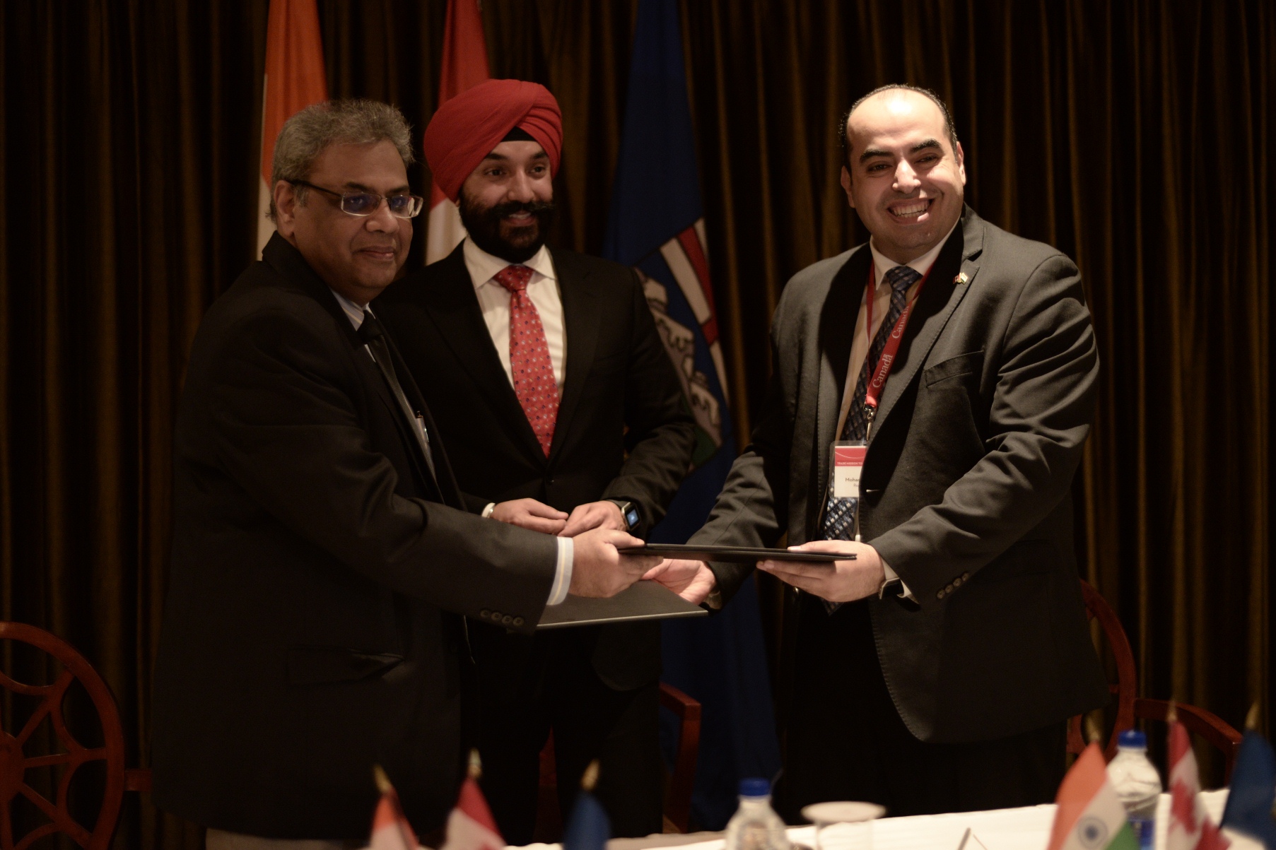 From left: Mr Sarvesh, Navdeep Bains and Dr Elhabiby. Eupheus Learning