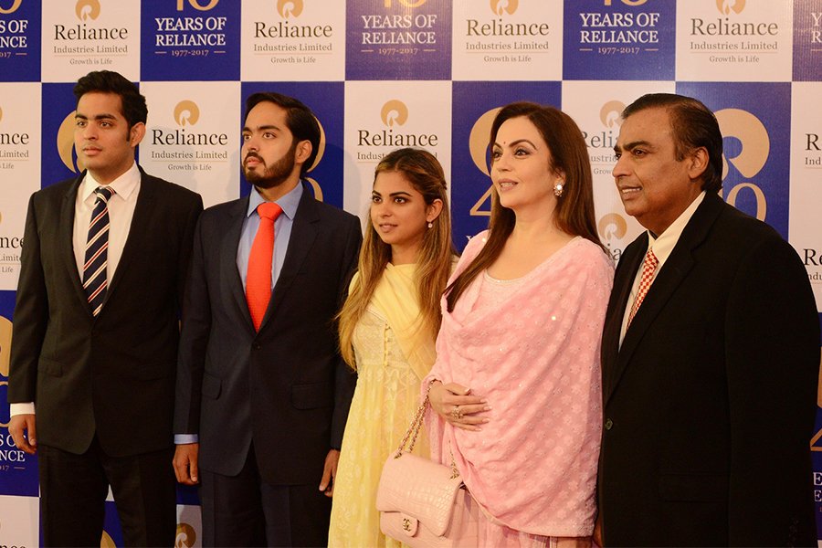 Mukesh Ambani (right) with his family.
