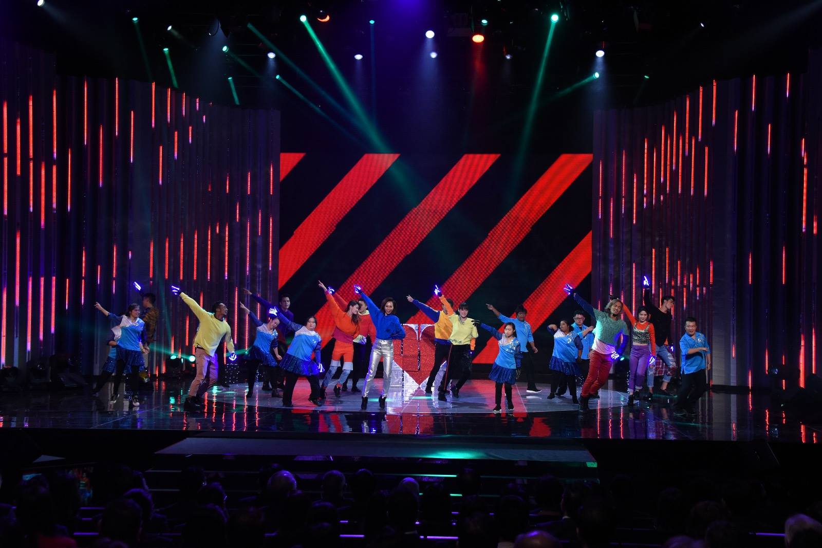 Artistes with members of the Down Syndrome Association putting up a dazzling dance performance at the President's Star Charity programme in Singapore. 