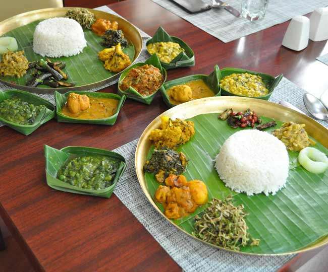Seasoned with the spicy chili pepper, Manipuri thali consists of rice, fish, leafy vegetables, Tan Ngang (bread) and the irresistible dessert Chahao Kheer, which is made with black rice
