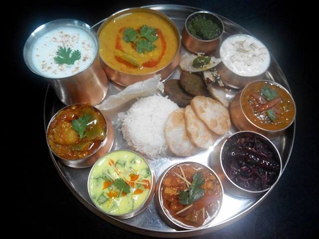 The state's trademark thali comprises of delicacies such as rakhia badi, pethas, rice pakodas, bafauri, steamed rice, fara (crispy balls made with leftover cooked rice)