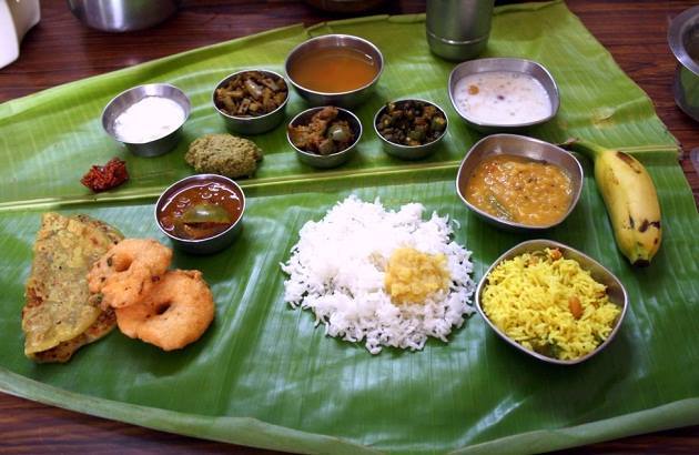 High on red chillies and spices, Andhra thali offers food which is simple yet packed with flavours, ranging from rasam, chutney, vada, rice and more