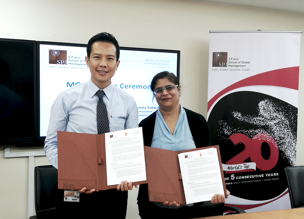 Dr John Fong (left), CEO and Head of Singapore Campus at SP Jain School of Global Management and Asmita Tadwalkar, President of Maharashtra Mandal Singapore showing the signed MOU.