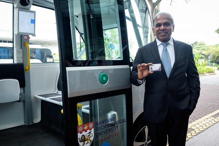 NTU’s new president, Professor Subra Suresh holding the new multi-use smart card. Photo courtesy: NTU