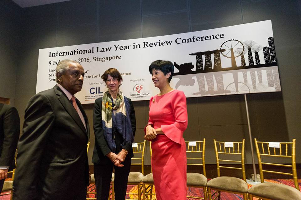 Professors S Jayakumar and Lucy Reed congratulate Indranee Rajah on her thought-provoking opening address