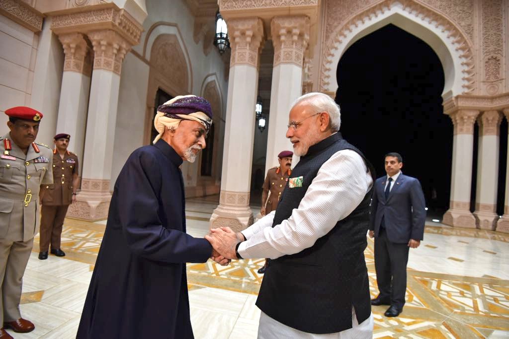 Indian Prime Minister Narendra Modi holding hands of Sultan Qaboos of Oman signifying closer bonds between India and Oman.