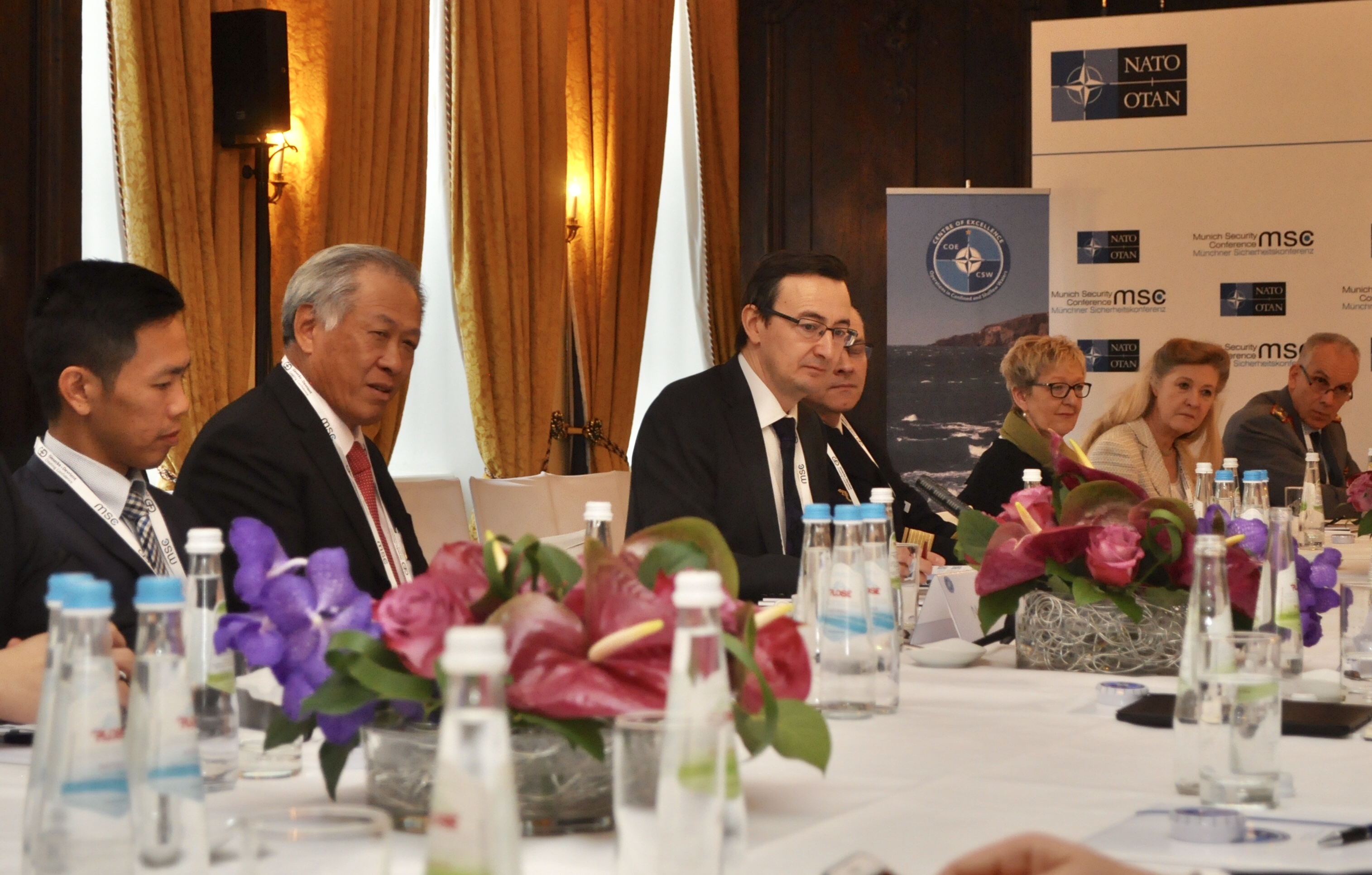 Minister for Defence Dr Ng Eng Hen (second from left) speaking on the topic 