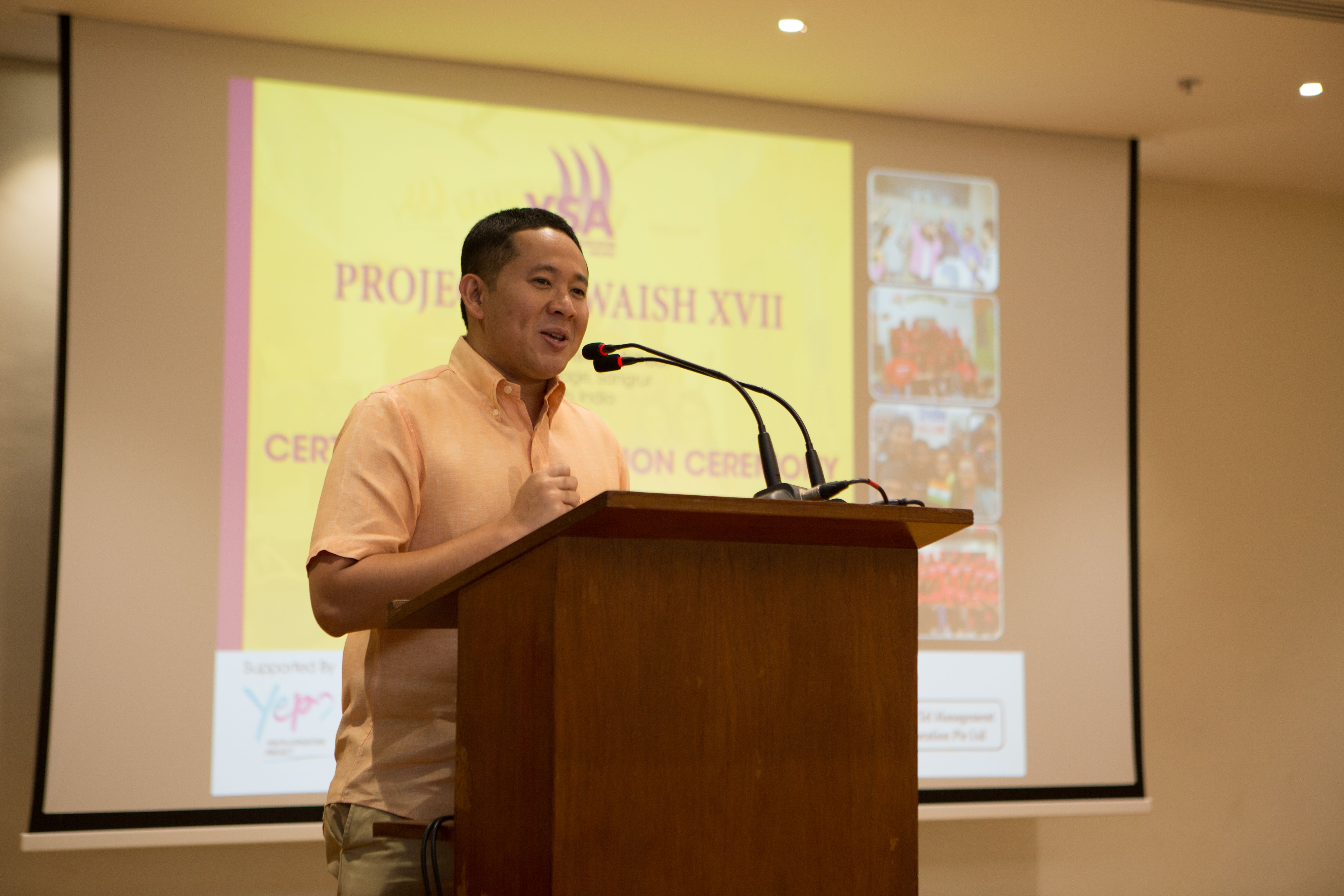 Amrin Amin speaking at the certificate presentation ceremony in Singapore for honouring the volunteers of YSA who transformed a village school of Punjab. 