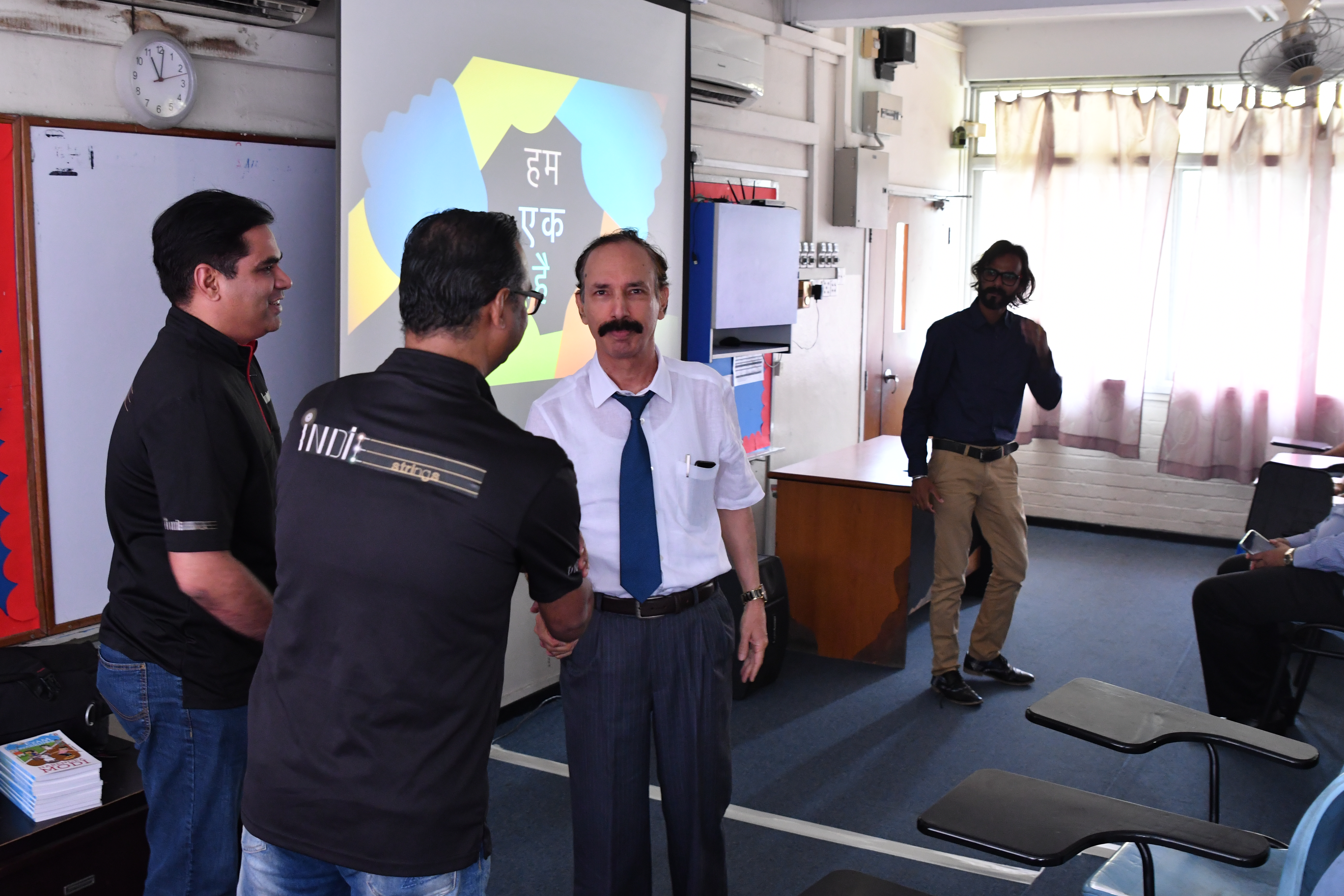 The IndieStrings team (left) with DPS International School Principal Col C Gill (centre) and Vande II music coordinator Anand Dhamelia (right). Photo courtesy: IndieStrings.
