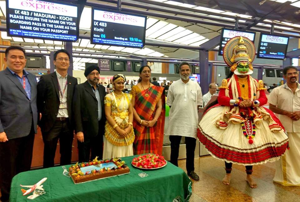 People celebrating the launch of the daily Madurai-Singapore flight on all seven days of the week at the Changi Airport.