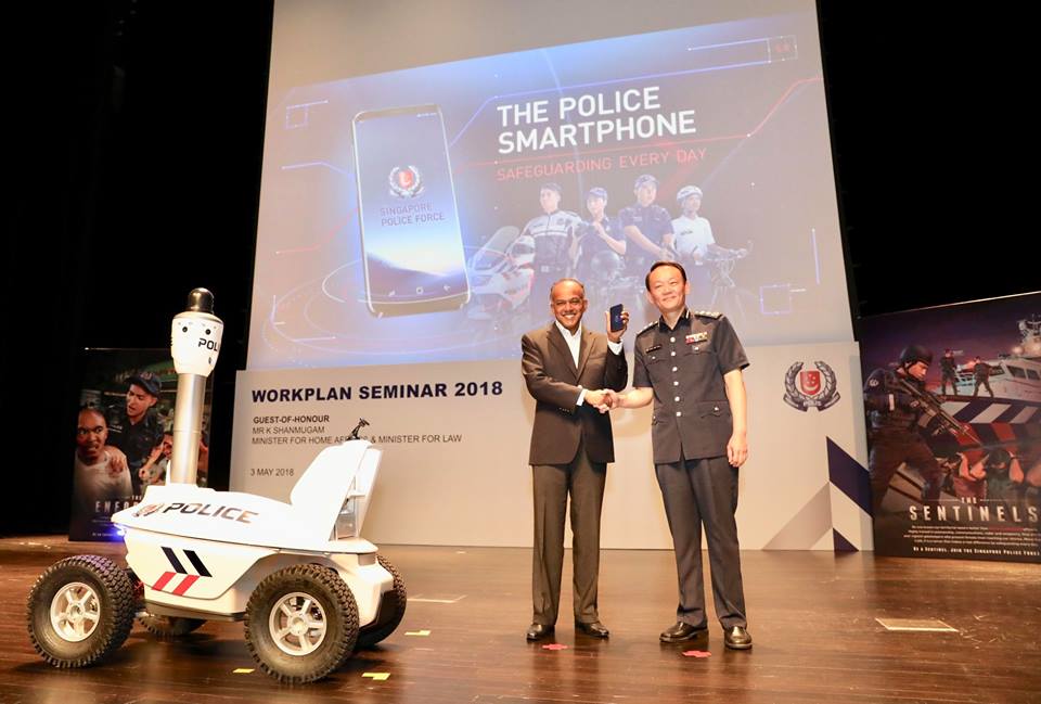 Singapore Law and Home Affairs Minister K. Shanmugam (left) at the launch of the new police smartphone during the Police Workplan Seminar. Photo courtesy: Facebook/@SingaporePoliceForce