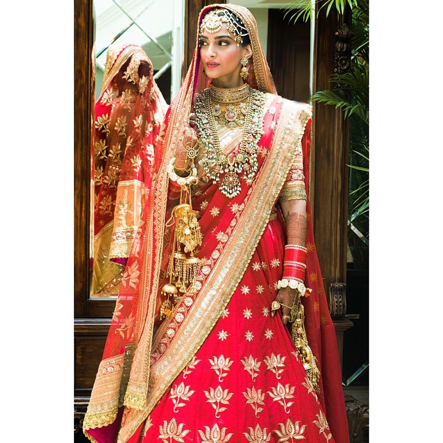 Sonam looked stunning in traditional bright pink lehenga. 