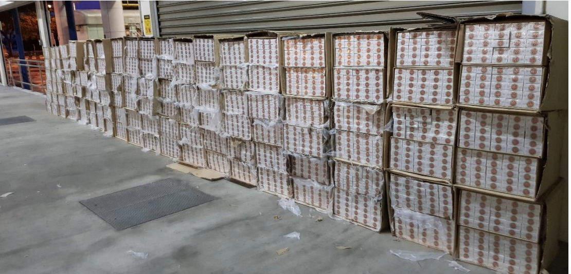 6,000 cartons of duty-unpaid cigarettes were uncovered in a prime mover on 18 May at Tuas checkpoint. Photo courtesy: ICA