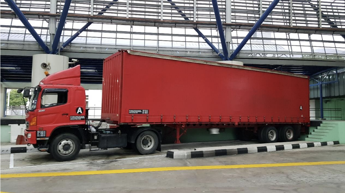The Malaysia-registered prime mover used to smuggle in the duty-unpaid cigarettes. Photo courtesy: ICA