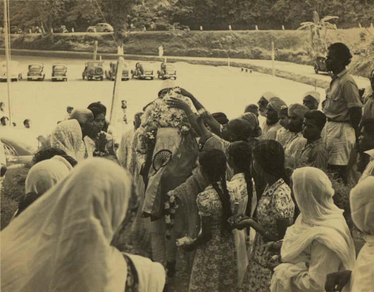 The love for Mahatma Gandhi among Singaporean people was so much that considerable number of them turned up and touched the urn containing  Mahatma’s ashes near Clifford Pier in Singapore. 