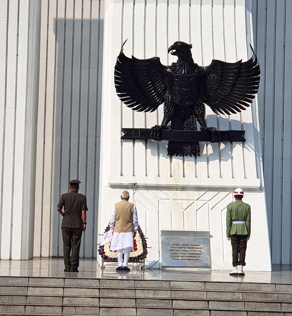 Indian Prime Minister Narendra Modi paying tributes to the martyrs of Indonesia's freedom struggle at the Kalibata National Heroes Cemetery in Jakarta.