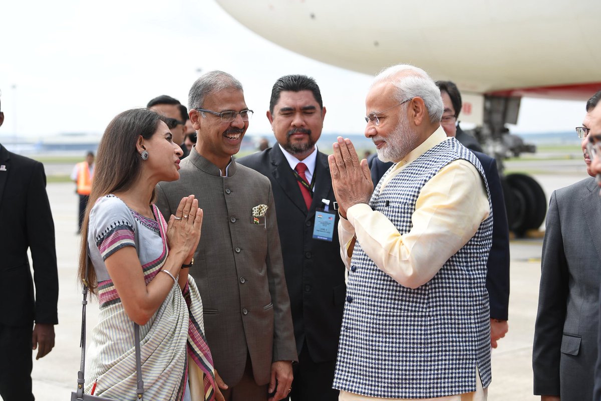 PM Modi being welcomed by Indian officials as he lands in Kuala Lumpur.