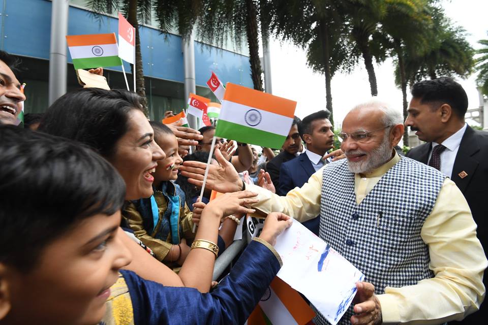 People belonging to Indian community enthusiastically welcomed Indian Prime Minister Narendra Modi on his arrival in Singapore.