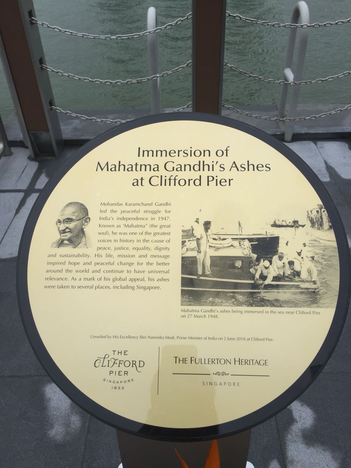 The board containing the details about the immersion of Mahatma Gandhi’s ashes at Clifford Pier in Singapore. 