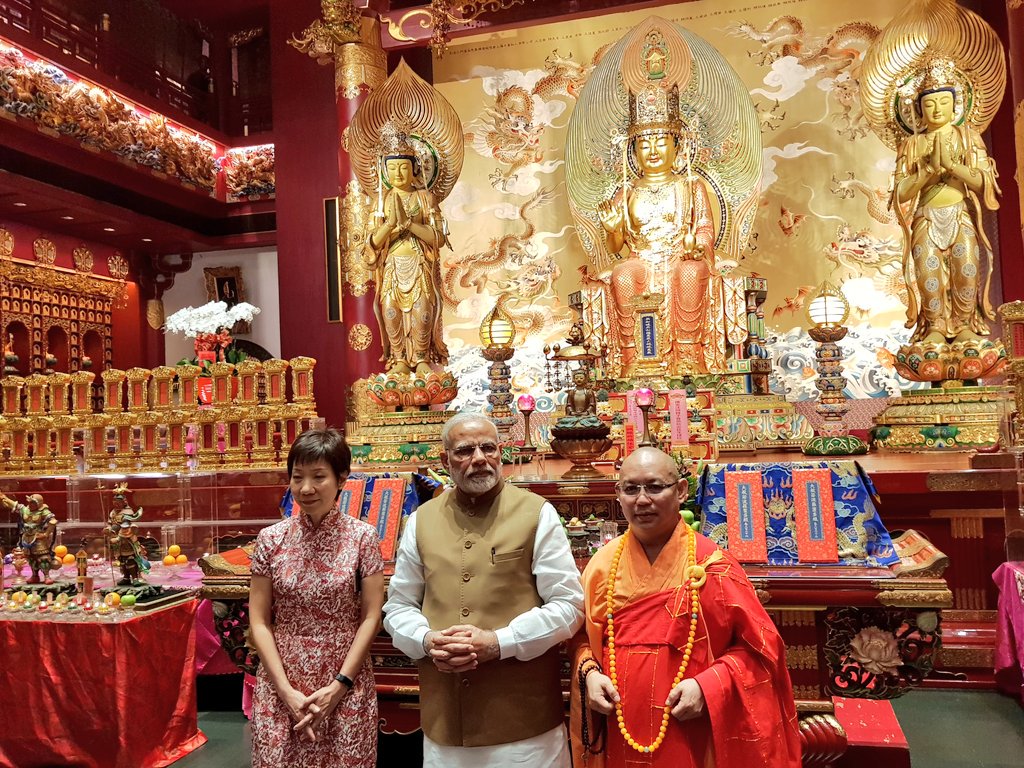 PM Modi along with Singapore Culture Minister Grace Fu Hai Yien (extreme left) at the Buddha Tooth Relic Temple and Museum.