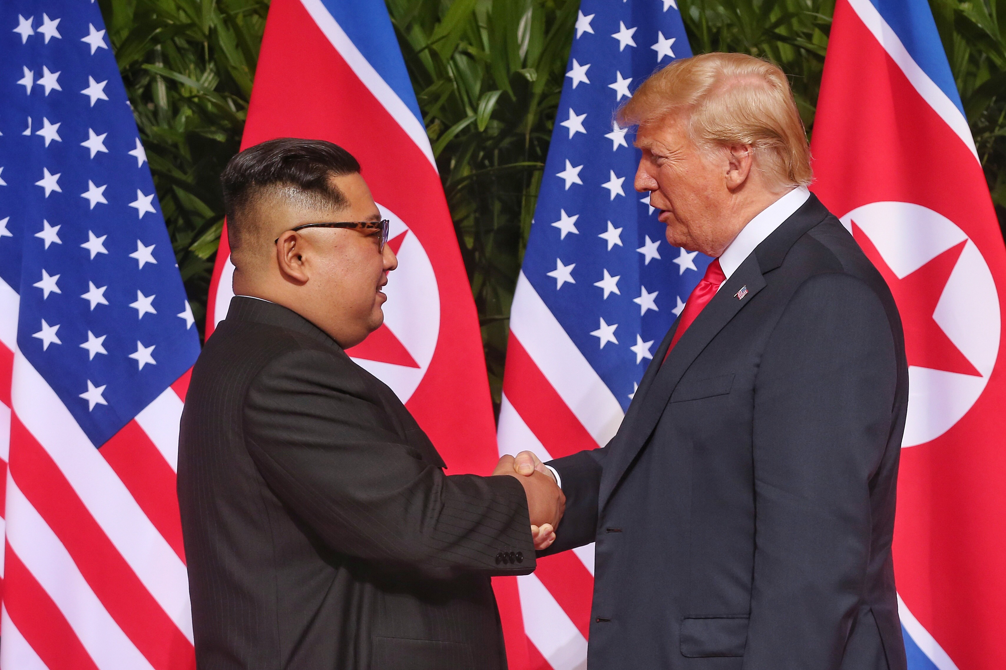 US President Donald Trump and North Korean leader Kim Jong Un shake hands in front of the world’s media as DPRK-USA Singapore Summit started today. 