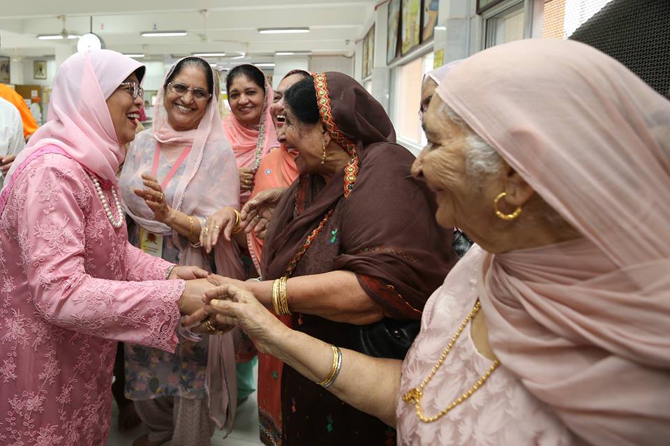 President of Singapore Halimah Yacob interacting with women of Sikh community during centenary celebrations of Gurdwara Sri Guru Singh Sabha(SGSS) in Singapore. 