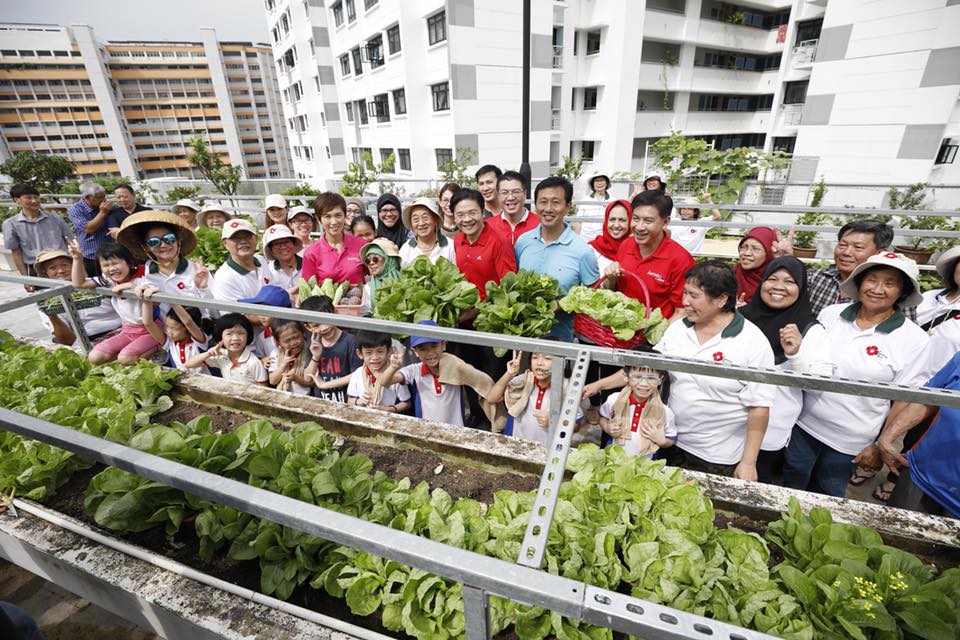 Ong Ye Kung, Education Minister, Josephine Teo, Manpower Minister and Lawrence Wong, National Development Minister along with the residents and children at Jurong Central Sky Garden. Photo courtesy: Facebook page of Minister Josephine Teo 